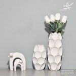 گلدان سکه ای و مجسمه